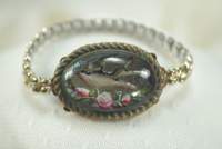 sreversecarvedandpaintedbirdfloralbracelet_small.jpg