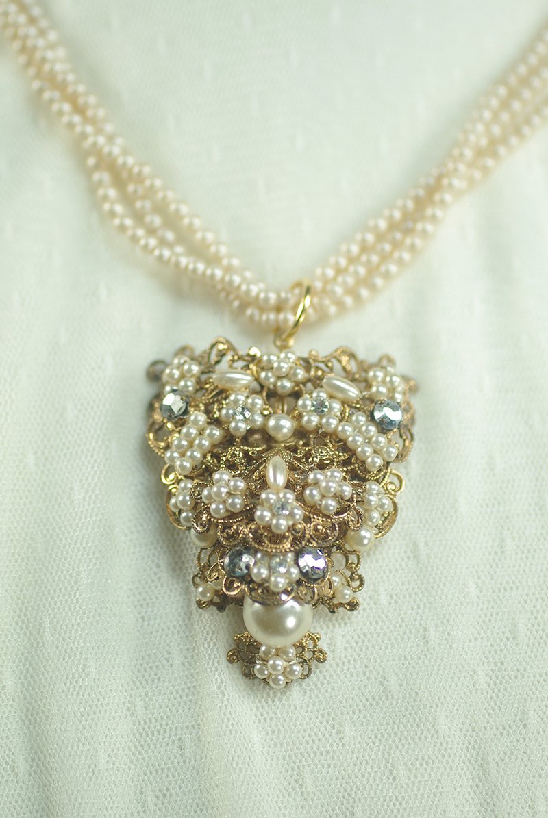 vintagepearlrhinestonependantonmultistrandpearlnecklace.jpg